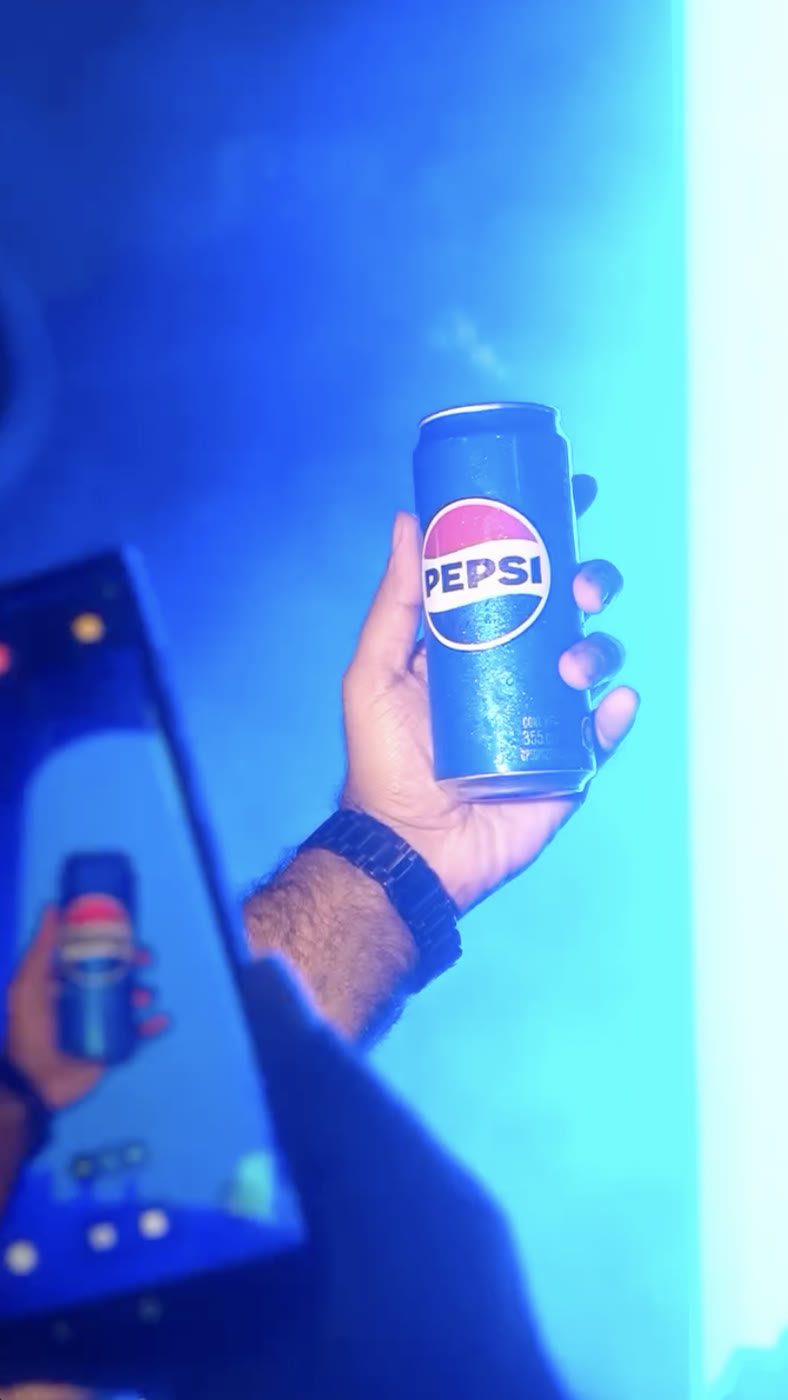 Pepsi can with blue smoke at the event